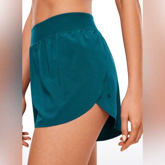 Feathery-Fit Soft Mid Rise Dolphin Lined Shorts 4'' - Picture 3 of 5